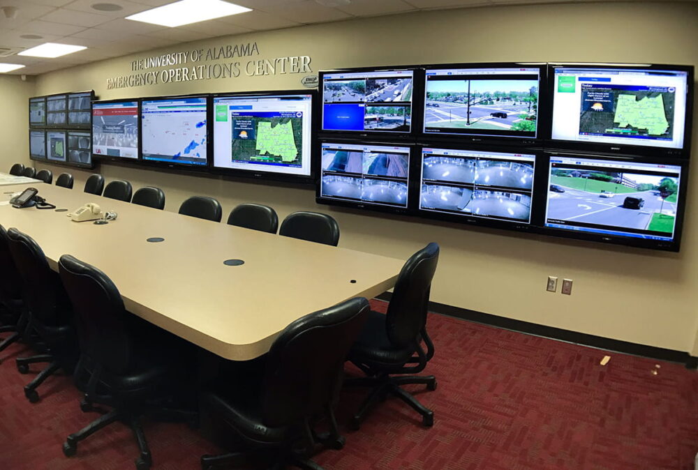 The Alabama Emergency Operations Center, showing numerous screens, using Kramer AVoIP devices