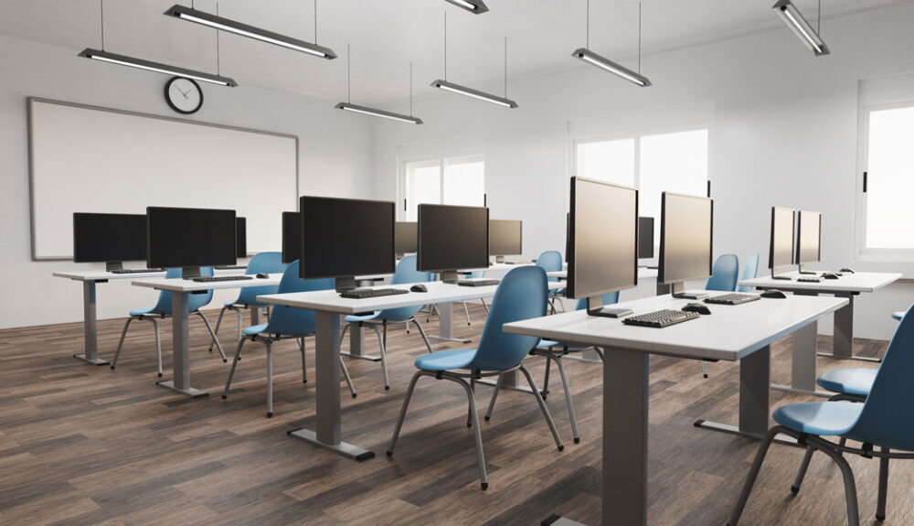 A classroom with blue chairs - an illustration of Jabra's education solutions, a partner of Kramer