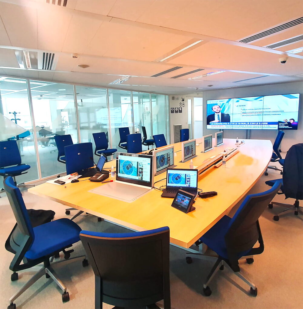 IRSN France Command and Control room, with numerous screens and a big TV screen, using Kramer Government and Defense solutions