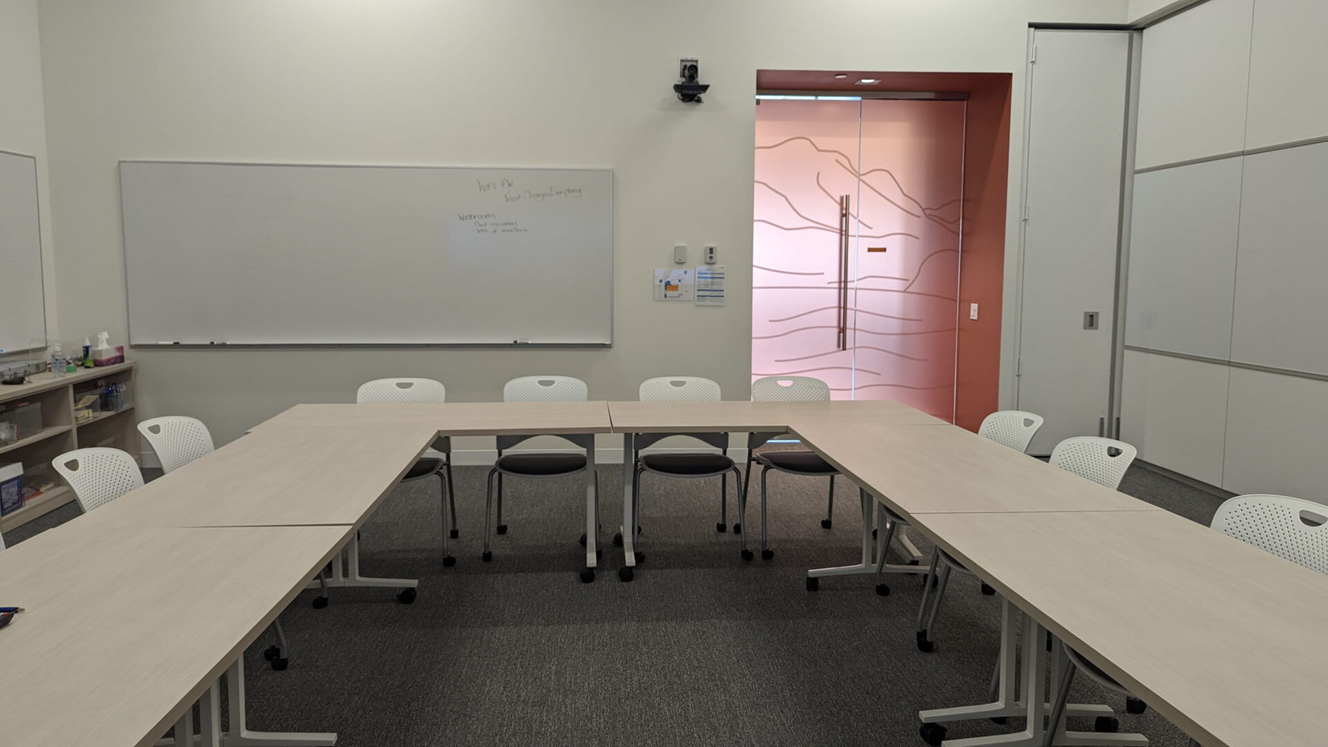 Improving's meeting room, a company where Kramer quicklaunch software is installed