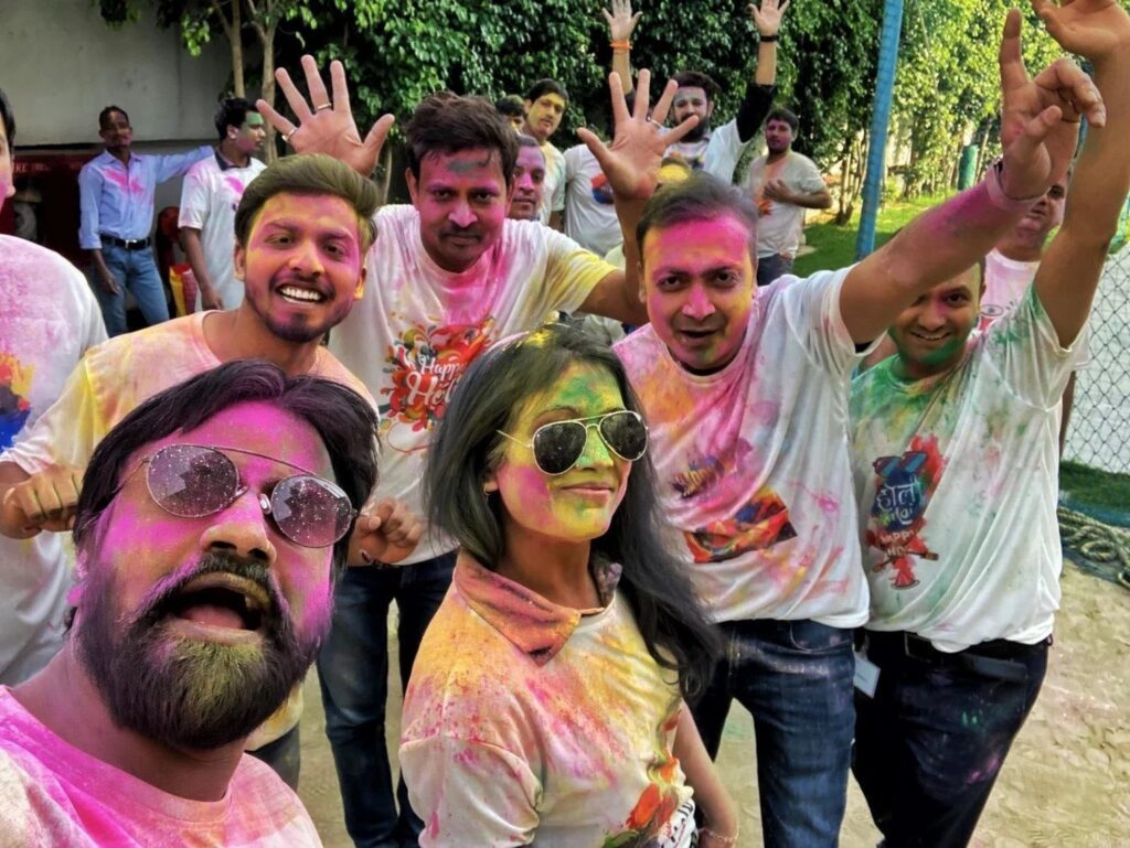 People having fun, waving at the camera